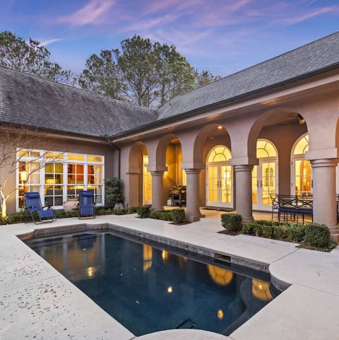 Take a dip in the heated pool or soak up the sun on a lounger