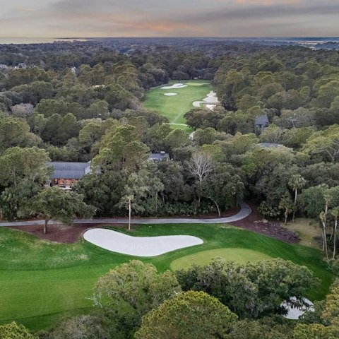 Play around or two on the nearby golf course