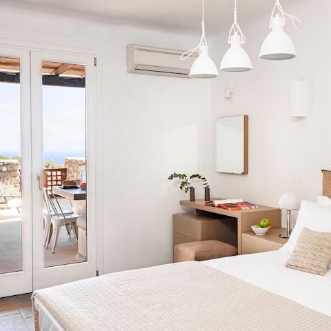 Wake up and throw open the French doors to let in the morning heat