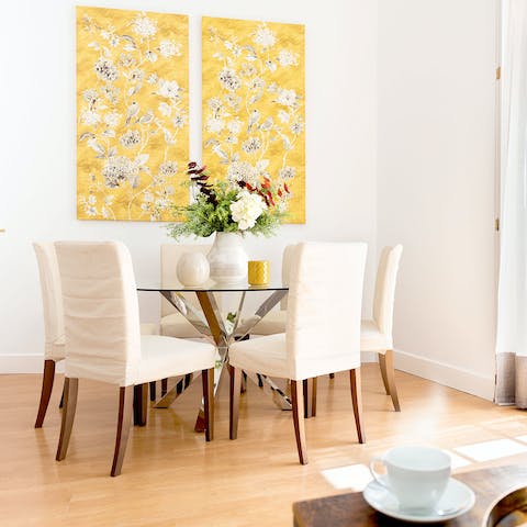 Share plates of tapas and paella on the dining table