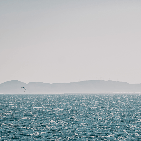 Explore the shore of the Costa Blanca and try your hand at parasailing