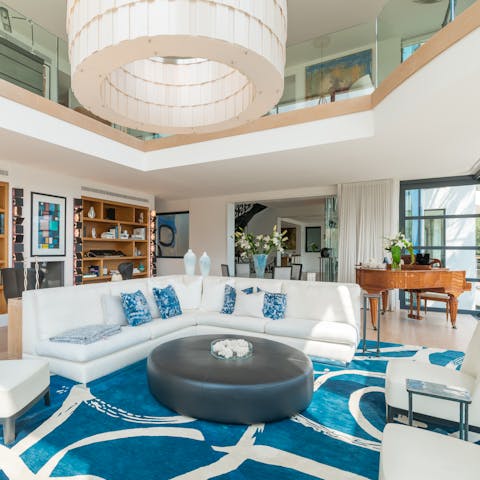 Play the piano in the spectacular living room