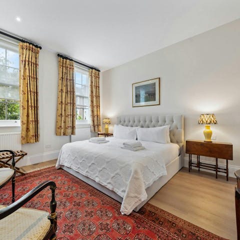 Sink into the comfortable bed after a day of London sightseeing