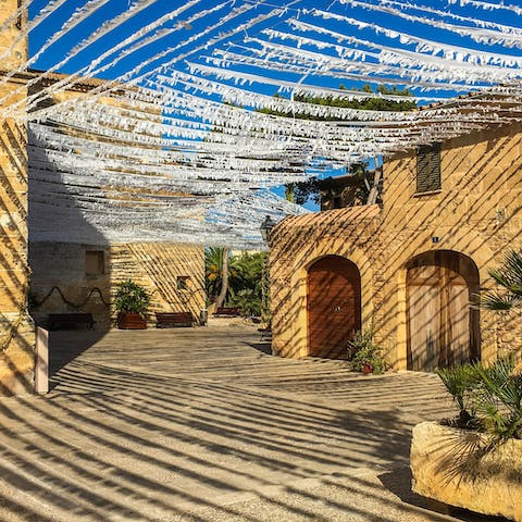 Stroll through the historic centre of Alcudia – just a short walk away