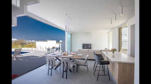 Fold back the doors and merge indoors with the pool terrace