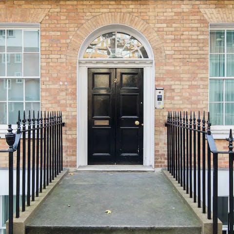 Arrive in style, at the majestic front entrance of this original Georgian building