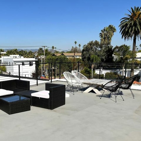 Relax on a private rooftop terrace with outdoor barbeque