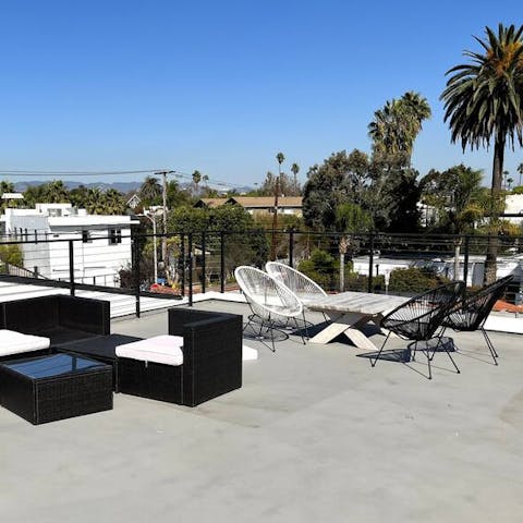 Relax on a private rooftop terrace with outdoor barbeque
