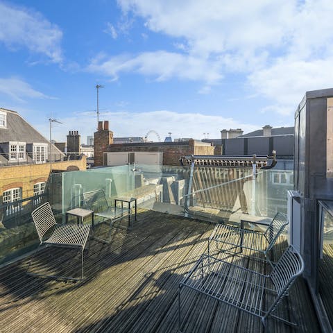 Enjoy glimpses of the London Eye from the private roof terrace