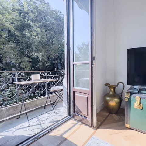 Have a glass of Prosecco on the balcony and take in the tree vistas