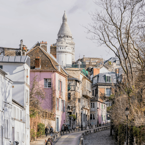 Discover Montmartre's art shops and iconic cathedral