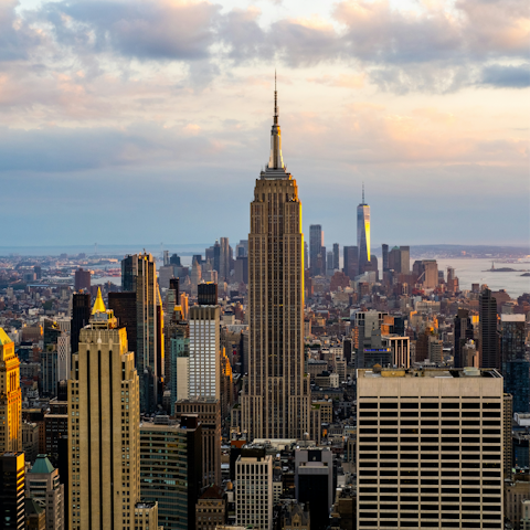 Visit the famous Empire State Building, reached in thirteen minutes by subway
