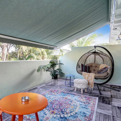 Relax in the basket chair and finally finish that book