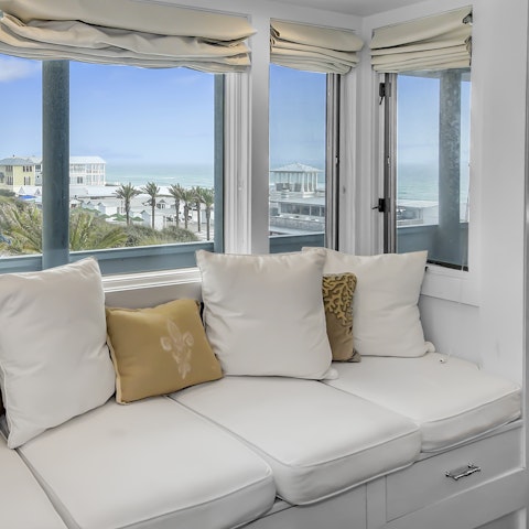 Enjoy views of the water from the main bedroom's window seat