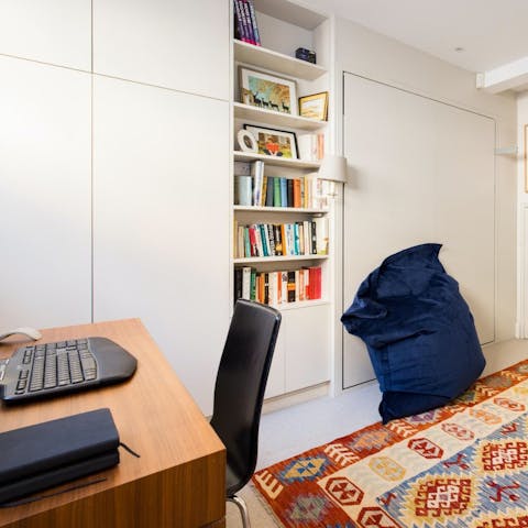 Fire off emails from the study or select a book from the shelves