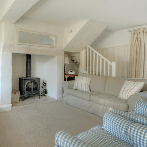 Cosy up in front of the fireplace when the weather turns