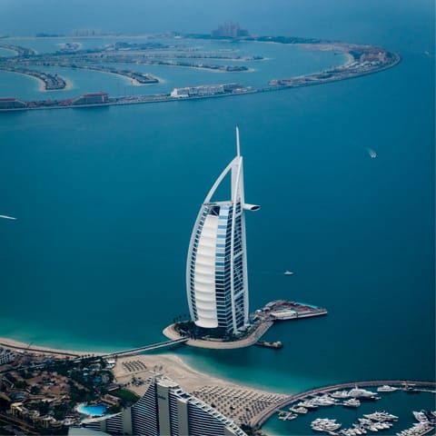 Look out over the artificial islands and sparkling sea from your JBR apartment