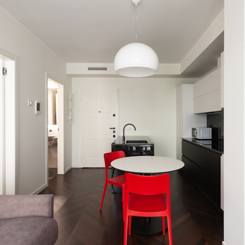 Begin your day with coffee and pastries in the sleek kitchen space