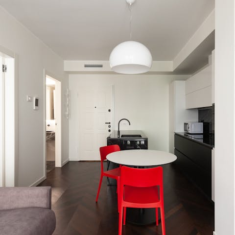 Begin your day with coffee and pastries in the sleek kitchen space