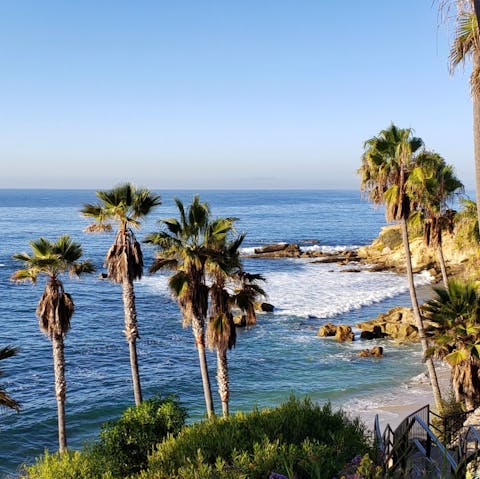 Drive down to Cardiff State beach for watersports and relaxation