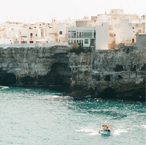 Pack a beach bag and explore Polignano a Mare – 15 kilometres away