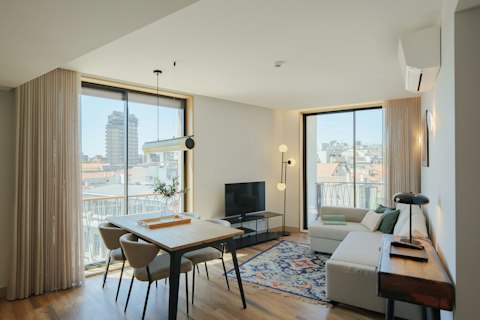 Catch rooftop views of Porto from the light-flooded living space