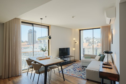 Catch rooftop views of Porto from the light-flooded living space