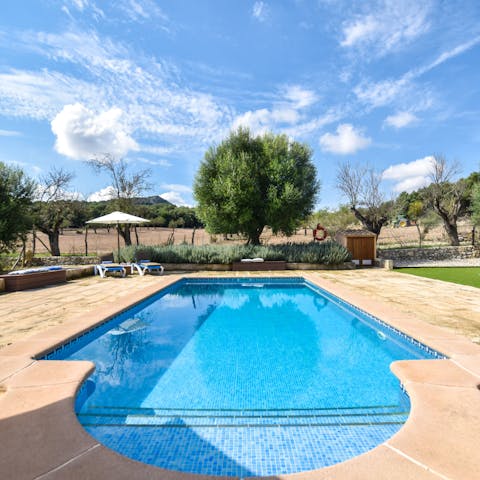 Cool off with a dip in the private pool or sunbathe on the lounge chairs