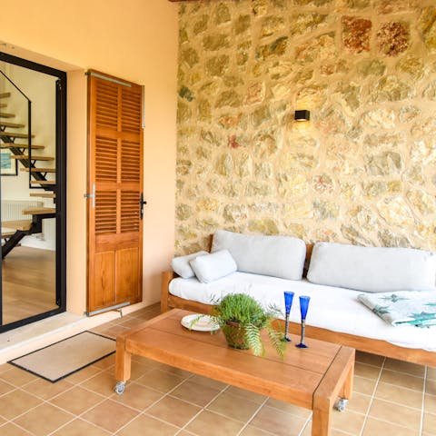 Sit back with a glass of sangria and soak up the Mallorcan countryside atmosphere