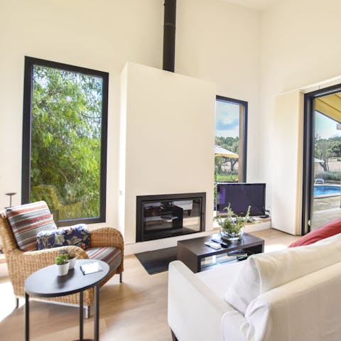 Take a break from the sunshine and sprawl out for a siesta in the breezy living room
