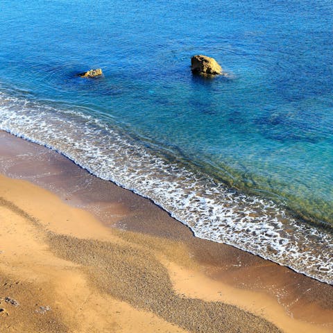 Stay a few steps away from the sprawling Kouremenos Beach, popular for watersports