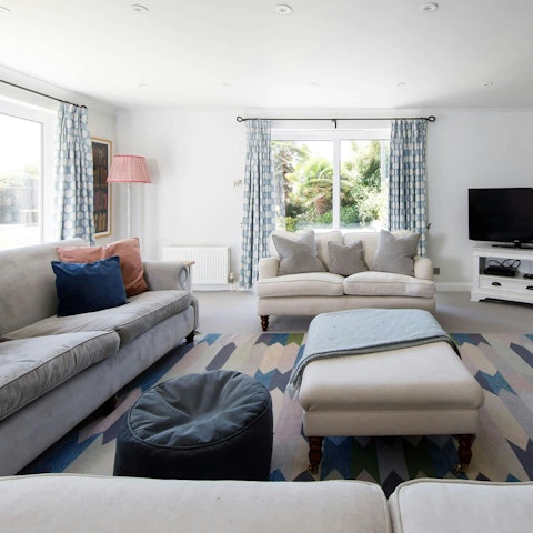Cosy up for a film night beside the fire in the sitting room