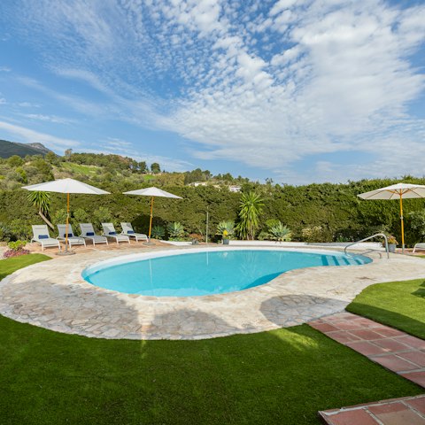 Sink into holiday mode by the poolside