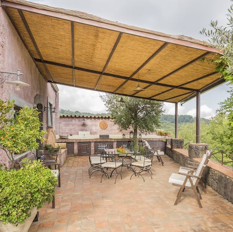 Whip up a delectable meal surrounded by beauty and birdsong in the outdoor kitchen