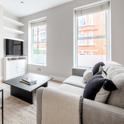 Relax after a busy day in the bright living area