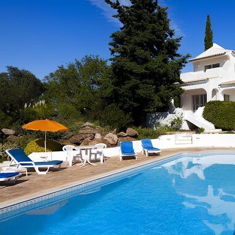 Find a wonderful sense of relaxation while lounging by the pool