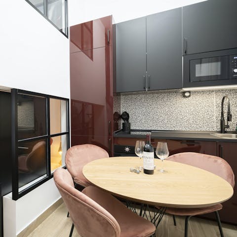 Pour a glass of wine and unwind around the dining table
