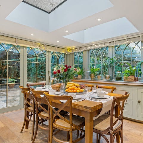 Enjoy family feasts in the attractive open-plan kitchen and dining space