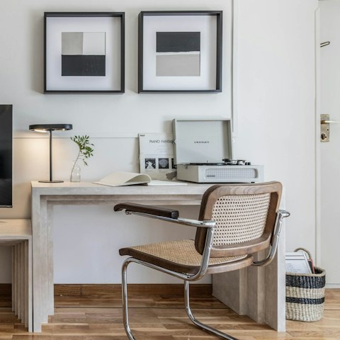 Listen to music and catch up on work from the desk