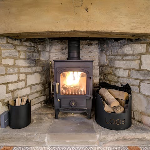 Get cosy around the wood-burning stove in cooler weather