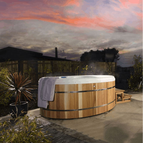 Unwind after a long day with a soak in the hot tub