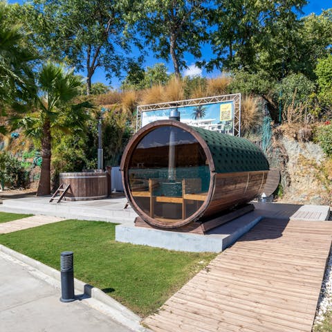 Unwind and relax in the communal sauna and Jacuzzi tub