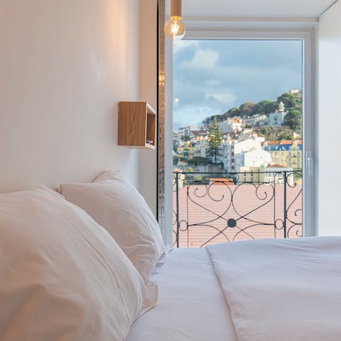 Peer over the balcony in the main bedroom with your morning coffee