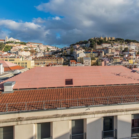 Gaze out to incredible panoramic views of the city from your living room