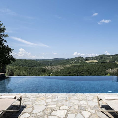 Soak up countryside views from the private heated pool