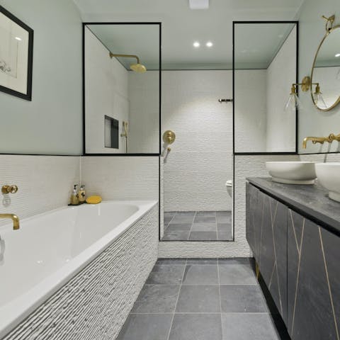 Unwind with a bubble bath after sundowners on the private patio