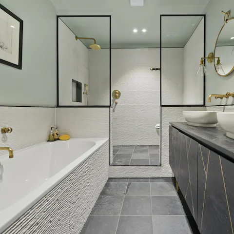 Unwind with a bubble bath after sundowners on the private patio