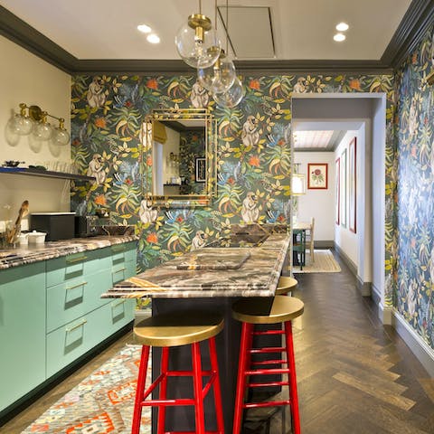 Begin each morning in a vibrant kitchen, planning your day at the breakfast bar