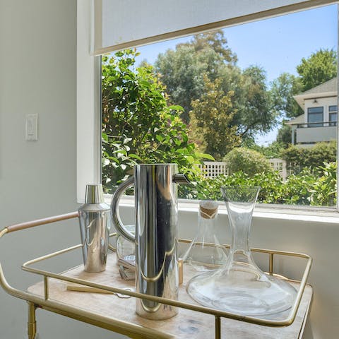 Shake up a cocktail or aerate your reds at the bar cart