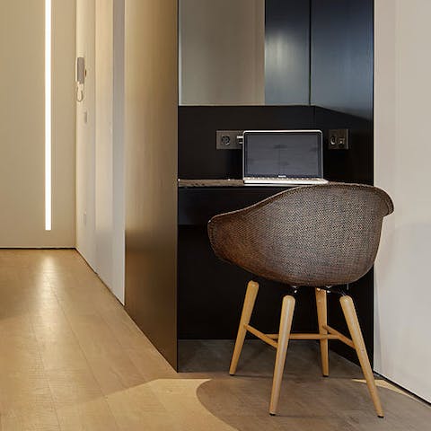 Check your email inbox and catch up on work at the desk in the living area